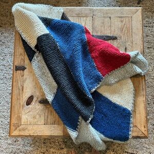 COLOR-BLOCKED HANDKNIT BLANKET